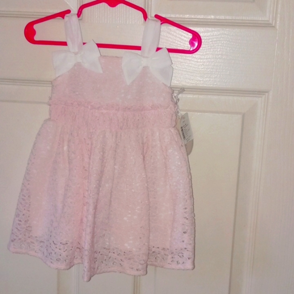 New with tags ** Size 6 months 12-18 lbs
